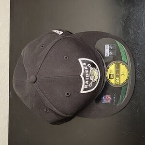 Fitted Ball cap, Raiders, size 7½, all tags are still on the cap, NewEra cap